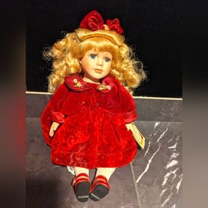 Porcelain Doll with Wind Up Music Box and Certificate of Authenticity